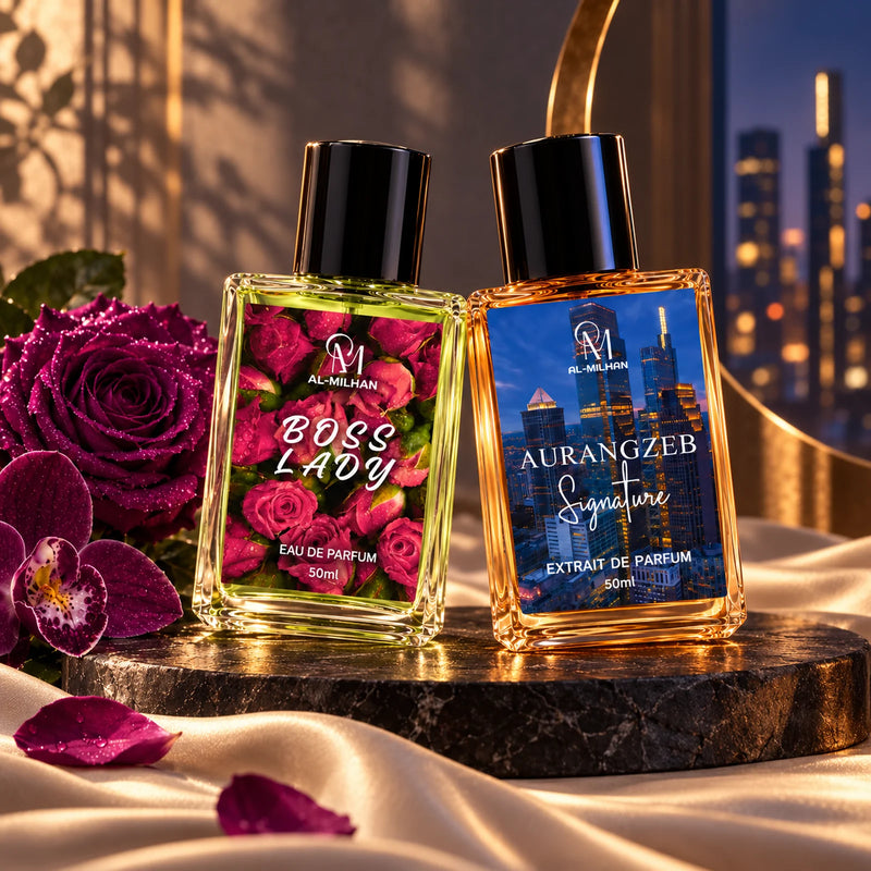 Aurangzeb and Boss Lady paired on a shared platform, with amber city architecture and purple roses. Boss Lady retains its exact red rose label and pale green fluid.