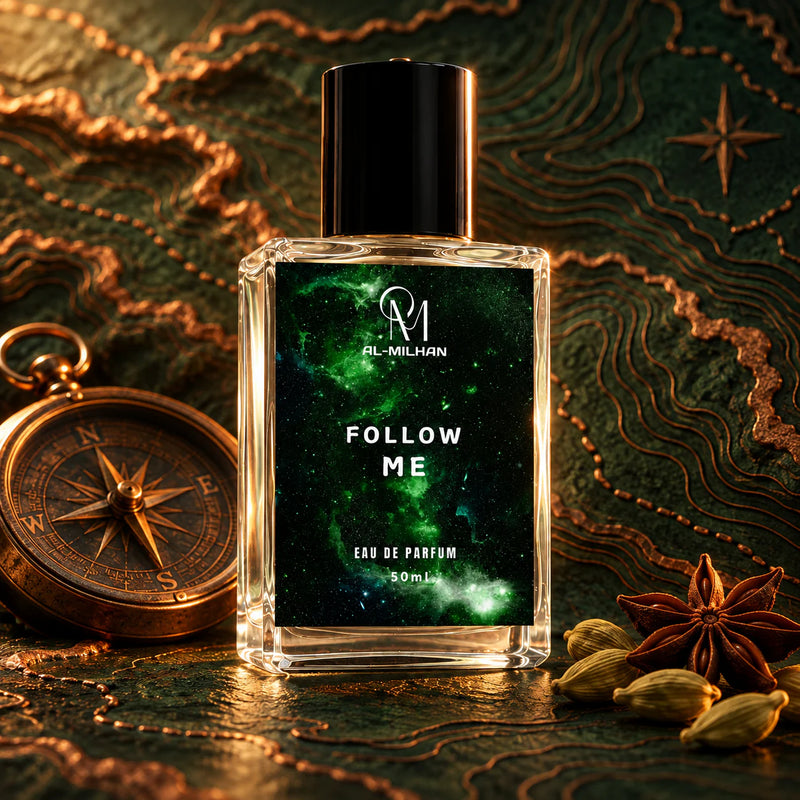 Follow Me clear perfume bottle on a green contour-map relief beside a copper compass, cardamom pods and star anise.