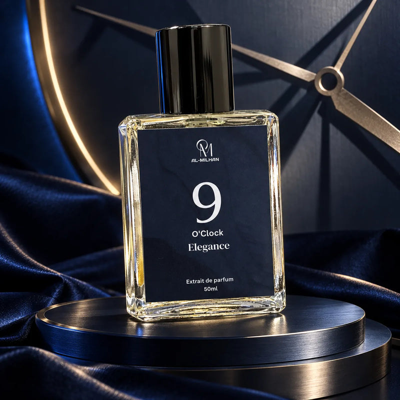 9 O'Clock Elegance perfume bottle by Al Milhan with its navy clock label on stepped discs with silver clock-hand shadows.